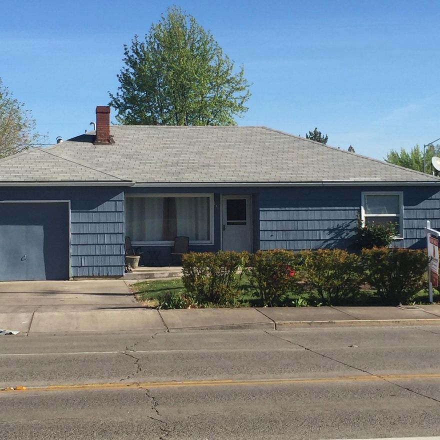 Newly Remodeled home with Real hardwood floors and ceramic tile throughout. Kitchen has custom oak cabinetry with island and lots of storage. Bathroom was completely remodeled as well with new tub, floors, custom cabinetry, countertops and sinks. Attached garage and a detached storage shed in back with alley access and room for boat, ATV whatever your heart desires. Take a look NOW!