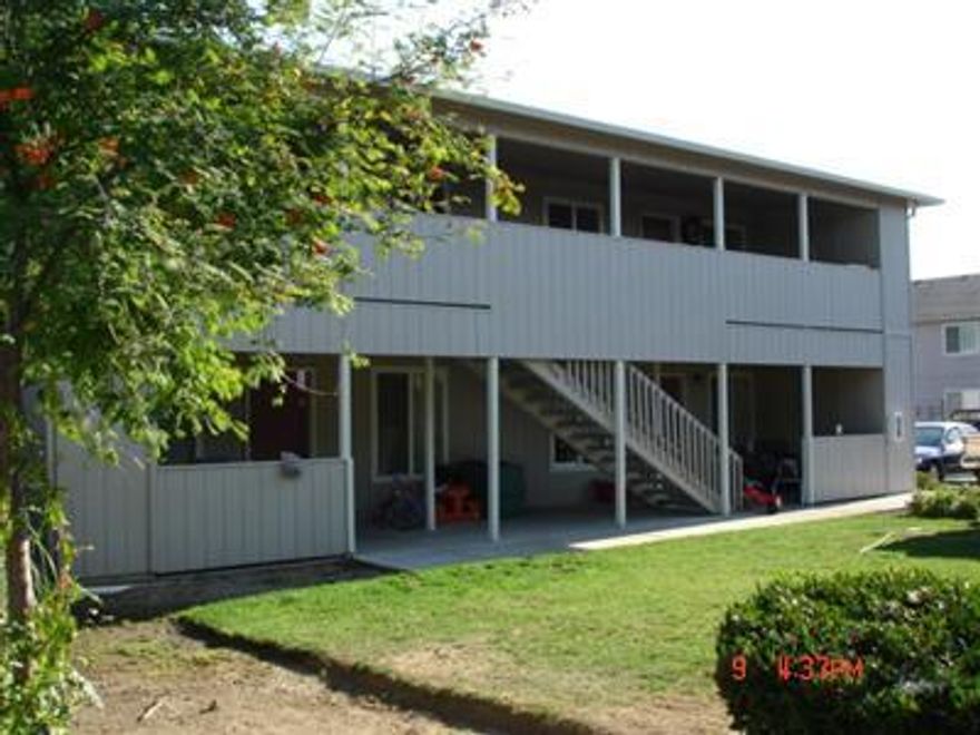 Great Investment Property. This newer 4-plex was built in 2000 with 2 bedrooms and 1 bath in each unit. Each unit consists of 933 sq ft with decks, washer/dryer hookups inside, good rental area with a very low vacancy rate.