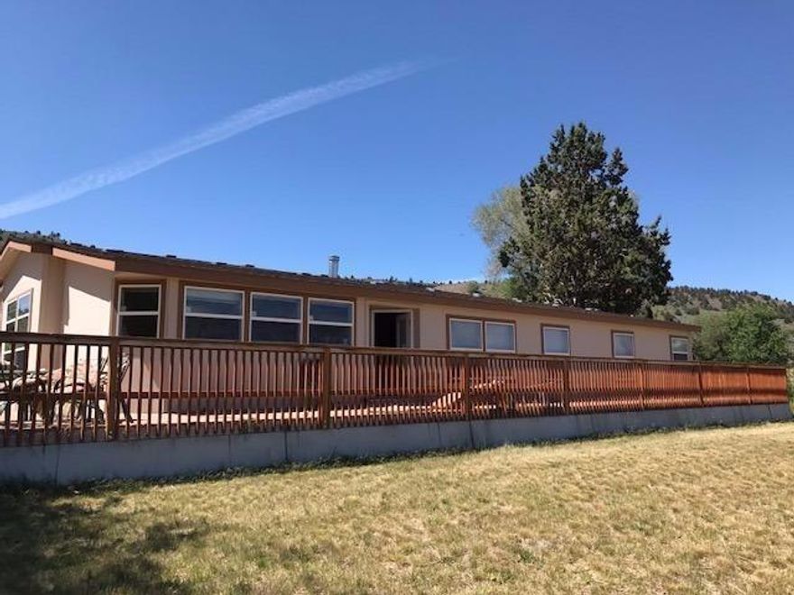 A must see well maintained 3 bedroom 2 bath home.Sit on your 110 x 70 Deck and look over the stunning panoramic views of The Olene Gap, North Hogsback ,Lost River , Horseshoe Dams as well as Crystal Springs Bridge. Inside you will find a large open floor plan , walk in pantry off kitchen. Living room, Dinning room and a Den off master bedroom. No problem watering to keep your grass green as the well is 1100' with its own fire hydrant on premises.There is a Large level asphalt parking lot for building huge shop. Small farm acreage.This property has it all with irrigation water rights through Klamath Irrigation District.Irrigation pipe included.