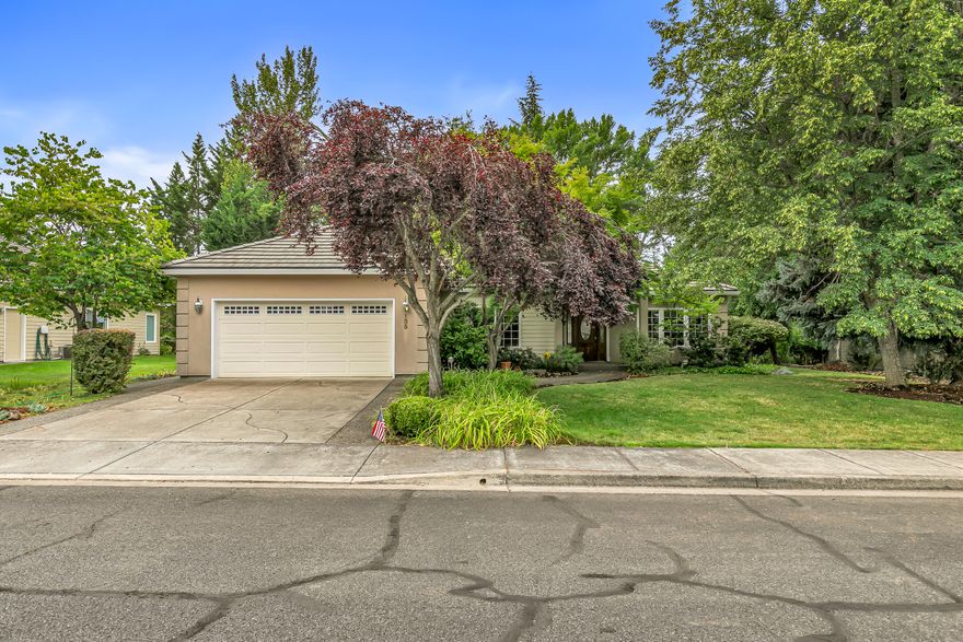 This great value in the Eagle Point Golf Community is over 1,964 sq. ft. 3-bedroom home with expansive living spaces and a lovely kitchen. Oak hardwood floors grace the entry, dining, kitchen and hallway under 9-10'' ceilings. The kitchen is quite spacious and features a dining nook looking out to the backyard. The living room is very spacious and has a gas fireplace and numerous built-ins. The 3rd bedroom would work well as an office/hobby room. Sizable primary bedroom has walk-in closet while the ensuite bathroom boasts double vanity, large soaking tub and walk-in shower. Out back is a large, covered porch for entertaining and a seasonal creek along the property line. Home has gas heat and water heater. This lovely home is located near the club house and Talon Grill on a quiet loop street. Come enjoy Eagle Point and discounts on Club Memberships at the golf course.