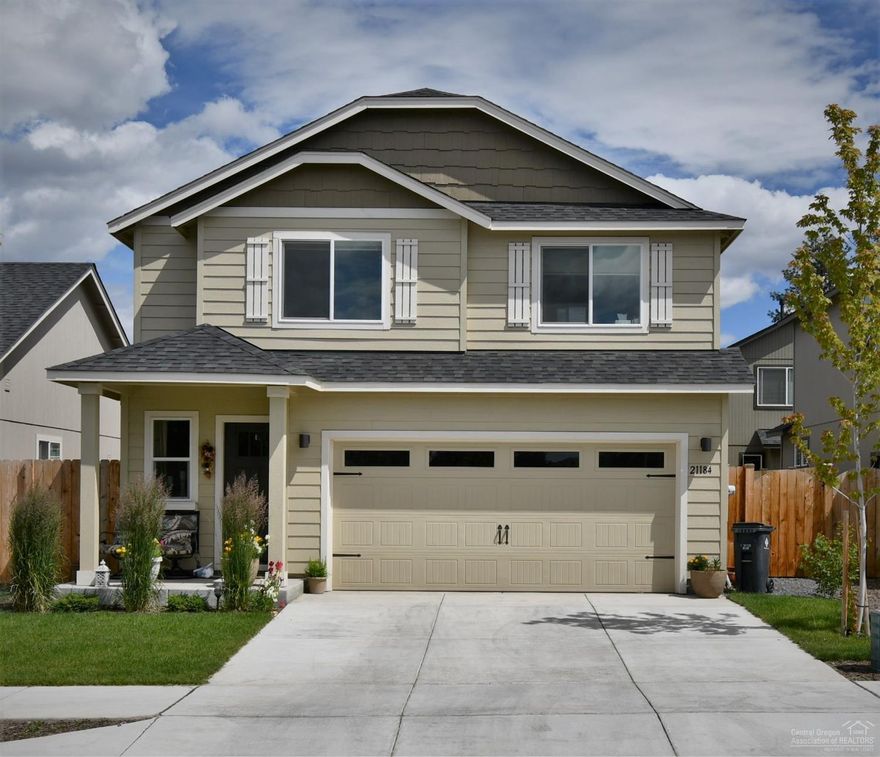 Wonderful location in SE Bend in Pettigrew Place. Close to Costco, shopping and the hospital. One year new home lightly lived in. Nice enlarged patio, garage man door to back yard, fully fenced back yard, timed sprinkler system, Enjoy relaxing on the covered front porch with nice views of Mt Bachelor. View of China Hat and Bessie Butte from upstairs bedroom windows. There are no homes on the other side of the street giving this home added privacy and quiet. You will appreciated the 4 ft extended length 2 car garage. Enjoy the AC on those hot nights! Pettigrew Park just a few blocks ways.