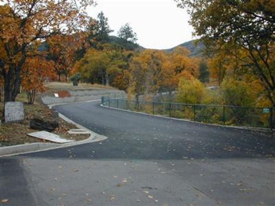 Paradise found ... Lot 2 in the new Westfield Subdivision. Minutes from the Plaza but a world away. This nearly one acre homesite offers spectacular views, gentle terraine, beautiful trees and full City services. This is the perfect location to build the home of your dreams. Enjoy the privacy & serenity of country living with the convenience of City services. Only three lots are available. HURRY! This one won't last. Owner is a licensed Broker in Oregon.