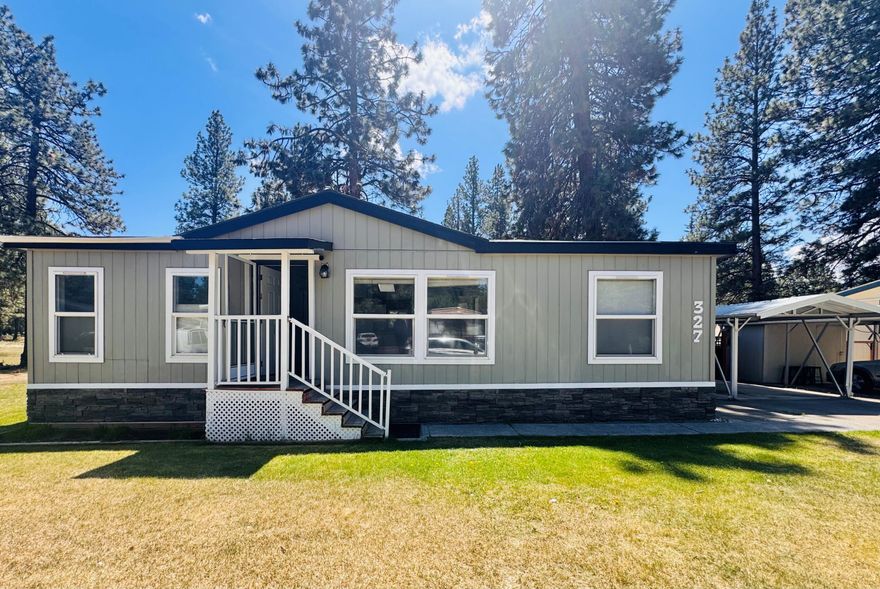 Tucked away on peaceful Driftwood Lane in Romaine Village, this upgraded manufactured home sits on an extra-large, fully fenced lot shaded by majestic pine trees—offering privacy, space, and that classic Bend lifestyle. Inside, you'll find newly installed carpet and a washer and dryer that stay with the home, making this move-in ready gem even more convenient. Recent upgrades throughout the home add comfort and value, while the oversized yard is perfect for entertaining, pets, or simply soaking in the serene surroundings. Located on the desirable southwest side of Bend, just minutes from trails, shopping, and downtown, this home proves you don't have to sacrifice style or location to live beautifully.