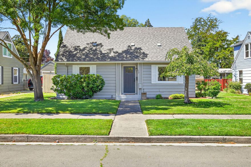 Fantastic, beautifully remodeled home with lots of character, new interior & exterior paint (including new exterior paint on the detached shop), partial brand-new roof with the other half in great condition, and tons of charm. This home features an open floor plan, 3 bedrooms, 2 bathrooms, approximately 1438 sq ft, hard wood floors and a
huge backyard. Large kitchen with lots of counter space and storage, travertine floors, a great blend of granite and butcher block counter tops, tile backsplash, and stainless-steel appliances. The dining room is open to the kitchen and to the living room with
large picture windows and lots of natural light. There are 2 bedrooms downstairs and 2 full baths with tile flooring. Located upstairs is a third bedroom and good-sized loft area that could be used as a playroom, office, or den. Home sits on .18 of an acre, large fenced backyard with covered patio, detached shop, covered car carport, alley access and mature landscaping. Move-in ready.