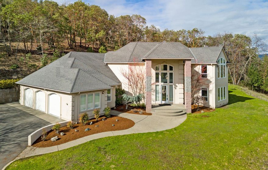 Luxury Custom Home located in the desirable Wildrose Gated Community, complete with it's own park, common areas & access to Cathedral Hills trails.  This lovely home sits on 2 acres with mountain and long range views!  The home boasts 4,017 sq ft, 3 beds, 3 1/2 baths, grand 2 story foyer, wall of windows to bring the outdoors in & great attention to detail, from the crown molding & lighted niches to the sweeping staircase, columns & built-ins. Brand new carpet throughout. The main level consists of  formal living & dining rooms, large kitchen with island, granite tile counter tops & pantry, breakfast nook, family room w/ fireplace, laundry rm & primary suite w/ walk in closet, fireplace & gorgeous bath! Upstairs you will find 2 bedrooms, a full bath, an office w/kitchenette, arched window & custom built-ins & a loft area overlooking the living room.  Exterior features include 3 car garage, easy care landscaping, private patio area in back & paved driveway.  Is this your new home?