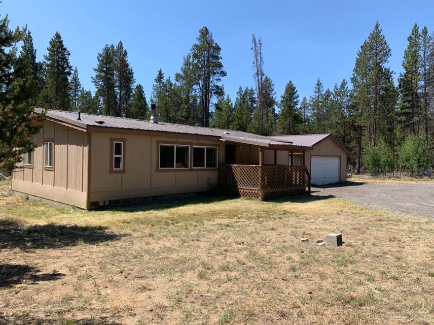 3 Bedroom 2 Bath Manufactured Home Built in 1981. Home is 1080 Sq Ft on .96 Acre, in LaPine Residential Area for the Future City Water and Sewer. Covered Front Deck. Detached 2 Car Garage. New Wood Stove in Living Room.