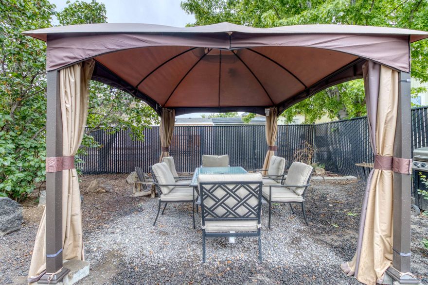 Ready for new owners. New carpet, new landscaping and more. Located on very quiet cul-de-sac, this 4 bedroom, 2.5 bath home features a covered front porch, gorgeous front landscaping and new plantings and turf in back. Raised garden beds too. Installed canopy will convey for a great summer hangout for those cold drinks.  High end laminate flooring on lower level, tile kitchen counters and corner gas fireplace in living room.  
Oversized, extra deep garage too.