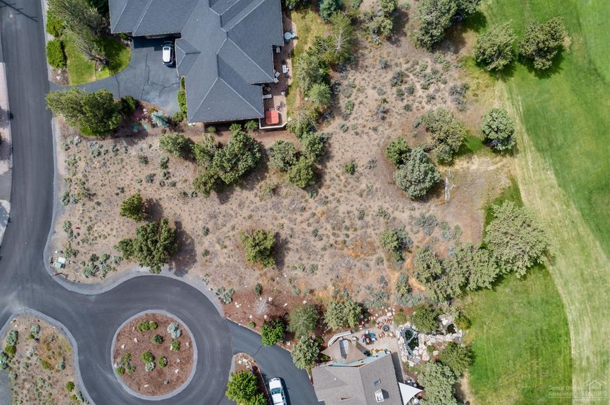 MUST SEE!! One of few premium golf course lots available at Eagle Crest! Flat almost half acre lot on a court providing privacy. Back to the Ridge Golf Course with potential mountain views from a 2 story home.