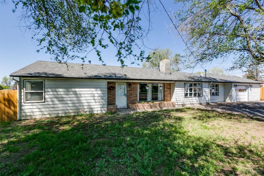 Ranch style home on 1.81 irrigation acres, close to town. Open concept living , 4 bedroom 2 bath 2036 sqft home. Large patio surrounded by beautiful trees perfect for entertaining. Property is complete fenced. Large shop with separate garage area and a bonus room above. Room for animals and toys!