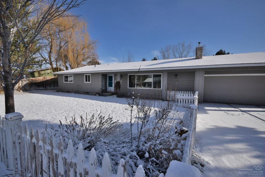 Welcome home! Don't miss out on this gorgeous remodeled home on .28 of an acre corner lot in sought after NW Redmond. An excellent layout with open living concept and tons of natural light. Since 2017 this home has been updated with a new 30 year comp roof, electrical panel, water heater, carpet and laminate flooring, walk-in-pantry, kitchen range, backsplash and shelving, and much more. Relax in either of the large living rooms that overlook the spacious private lot while enjoying the central heat or A/C. The front living room has a beautiful full height hearth surrounding the newer pellet stove. Outside you'll find a huge yard with mature trees, large raised garden beds, chicken coop, full sprinkler system, and RV parking with FULL hookups, (will easily fit a 40' RV). If you want privacy, elbow room, an updated home, and still be less than a block to Quince Park, this home is for you!<br>