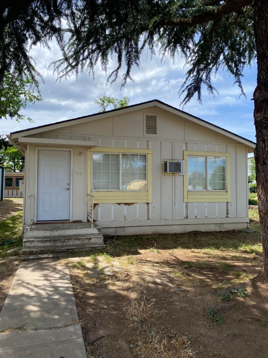 Great investment multifamily opportunity!! There are two separate homes located on the property. Each home has two bedrooms and one bath. There is plenty of off-street parking with a two-car carport, and a long driveway. 513 Kenwood is 864 square feet, and 515 Kenwood is 640 square feet. Each home with their own Gas hookups.  With some sweat equity and TLC this could be a real Gem!! Buyer to do their own due diligence with regard to possible uses.