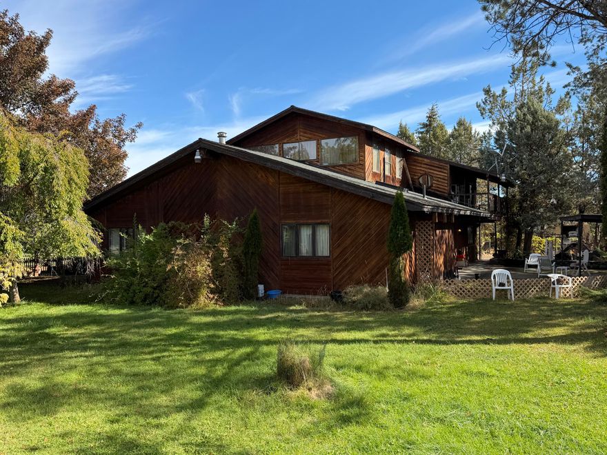 Escape to the country on this beautiful 30-acre farm with endless possibilities! The property offers plenty of room for horses, cows, goats, sheep, or any livestock of your choice. Enjoy the convenience of an irrigation pond, multiple old outbuildings, and a spacious 3,288 sq ft home. The main level features 3 bedrooms, 3 bathrooms, a full kitchen, laundry room, and living room. Upstairs, a separate apartment-style space includes 2 additional bedrooms, a living room, and a bathroom — ideal for multigenerational living, rental income, or guest quarters. Peaceful rural living with room to grow, explore, and create your dream farmstead. An additional 39.09-acre parcel next door is also available from the same seller.