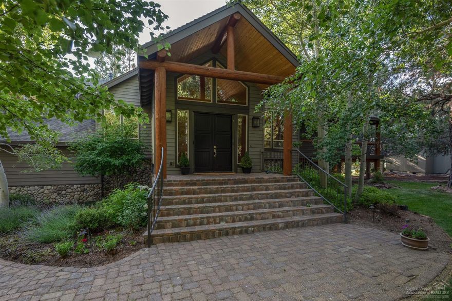 Spectacular home in a fabulous setting on the golf course in Awbrey Glen. An incredibly Private 1/2 acre lot w/Mature Trees overlooks the 2nd fairway for amazing golf course views. The deck stretches the length of the home for a wonderful outdoor area for entertaining or simply relaxing. This versatile floor plan truly lives like a single level home with many benefits. Main level inc the GR, Romantic Master Suite w/ gas FP, Bonus Room plus an Office w/FP. Open Floor Plan inc Spacious Great Rm w/ Vaulted Ceilings, Impressive Stone Wd Burning FP w/ Raised Stone Hearth & gas jet, Floor to Ceiling Windows, Gourmet Kitchen w/ Slab Granite, Spacious Eating bar, Stainless Appliances, Wine Cooler, Kitchen Aid 6 Burner + Griddle, LG Refrigerator, Built-in Desk & Large Walk-in Pantry. Downstairs are 3 additional bds, 2 full baths & another bonus/media room w/wet bar. Quality craftsmanship is evident w/wood wrapped windows, solid core doors & HW floors. 3 Car Garage & Dramatic Water Feature.<br>