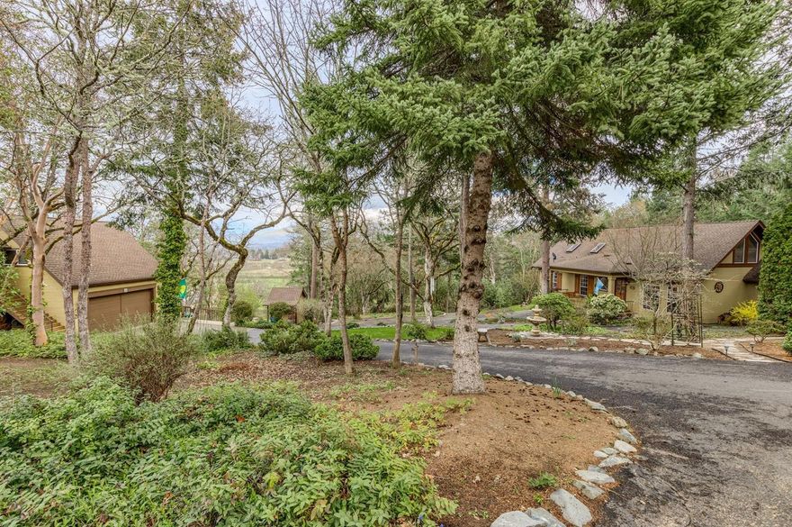 Spectacular Southern Oregon Home. Conveniently located between Medford and Jacksonville and close to several great wineries. Stunning home that sits on 4.2 beautifully maintained park like acres. Property has .90 ac of TID irrigation w/ two 3000 gal storage tanks that is available for fire suppression and for all your landscaping needs. Home incl. 352 sq ft all season enclosed patio with updated wood stove for winter use and removable glass panels for screened in summer use. Loft / Theater room with surround sound. Master Suite on main floor includes jetted tub, fireplace and private deck with views of the Rogue Valley. Amazing Kitchen with granite counters, hardwood floors and great storage. Detached 23X28 shop with updated bathroom along with a recently remodeled in-law suite upstairs. Home Heat pump was replaced in 2018 and is controlled by Ecobee Smart thermostat and new septic tank installed. Come and enjoy your own little sanctuary today.