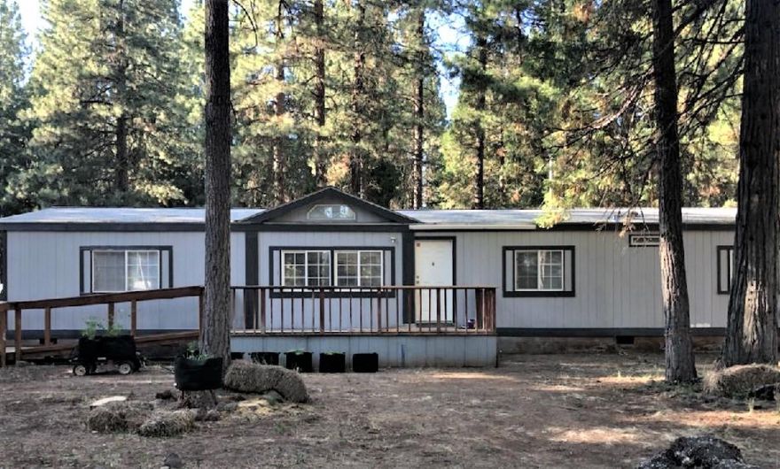 This home is a must see!! It sits on just over an acre with 3 bedrooms and 2 baths.  This house has been updated inside and out, including a new septic tank. Home has new interior and exterior paint, new carpet in the bedrooms, new kitchen cabinets as well as kitchen appliances.  You will also find a split floor plan and decks front and back.  Don't wait, schedule an appointment today!