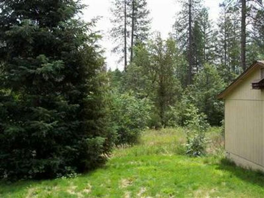 Beautiful 2.41 Acres Of Wooded Property. Great Place To Build Home. Has 2 Car Nice Garage, Open Fields Partly. Mobile Is Very Livable And Clean. Great Well. Assumable Va With Large Down. Call L/A