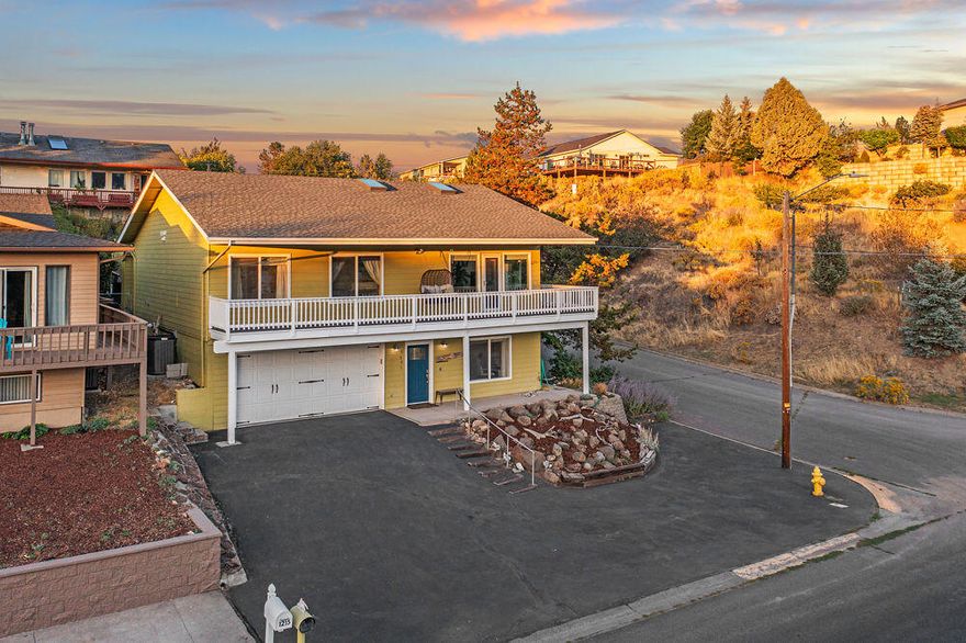 Check out this turn key, 4 bed 3 bath home located across from the lake with incredible views! Watch the local pelicans, bald eagles or the sail boats from the large covered wrap around front porch! The entire home has been tastefully updated with high end finishes! Including but not limited to the floor to counter granite slab counter in the kitchen with updated appliances and cabinets! Dual primary bedroom setup, allowing for different living arrangements, and potential investment income as well. There is also a finished bonus room off of the garage previously used for a working photography studio space, and would function well as an office, play room and more! 3 bedrooms and 2 baths are on one level and the second primary is on the lower level. Backyard is a private, zen feel, low maintenance yard and fully fenced. You really have to see this property in person to truly appreciate all of the beautiful finishing touches the current owners have made to this property!