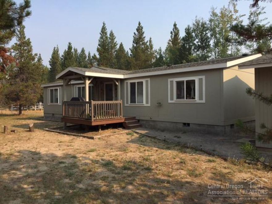 Large home on big lot in a very quiet corner of OWW. Easement across street extends 400 feet to the Big Deschutes for your kayak launch. Wonderful existing tenants willing to lease for $1,700.00/mo. Large bonus room addition built on concrete stem wall foundation in 1997. Roof in excellent condition. Possible 2 additional bedrooms/office areas in existing adjoining rooms. High ceilings and spacious kitchen w/New AC unit installed in August 2017, Efficient heat pump. 2 car garage. Community only boat ramp.