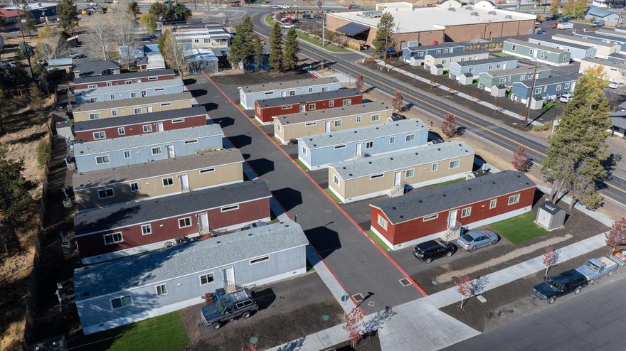 Hard to find 6.5% CAP rate in Central Oregon.  The site is improved with a 14 unit multi family development constructed in 2021 and is made up of 14 - three bedroom, two bathroom permanently affixed manufactured homes with A/C.  Coming soon, an additional 56 units across the street at a same CAP rate.  This income producing development is located in Central Oregon in the up and coming town of La Pine. It's close to Sunriver, Bend and all the outdoor adventures that draw people to the area.  Development is professionally managed and has 100% occupancy with a waiting list.