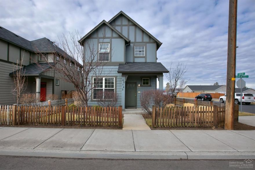 Winner of the 2007 COBA Tour of Homes Green Building Award & is a must see! This Earth Advantage home features many high end finishes such as: Hardwoods, iron balusters, Green tile kitchen counters, solar panels, tank-less water heater, 9ft. Ceilings, Vaulted Master Bedroom, Dual Flush Toilets, Marmoleum flooring, fencing, complete landscaping. On the main level is a spacious kitchen, a great room, den, utility room & dining area. 2nd level features two bedrooms w/guest bath and a private master suite.