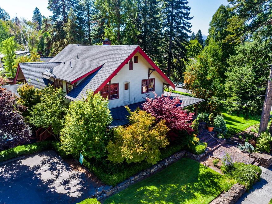 Welcome to the Lara House! This 1910 craftsman home situated in the heart of Bend's historic district has been renovated and meticulously maintained over the years. With an oversized lot perfect for entertaining, both outdoors and in, this historic beauty offers a gas fireplace, sitting rooms, one ensuite bedroom on the main level, four ensuite bedrooms on the second floor, and one bird's nest ensuite bedroom on the third floor. Located below the main house is a spacious one-bedroom apartment with a full kitchen and separate entrance. Lara House is conveniently situated just moments from Drake Park, downtown Bend, Galveston and Newport Ave, and the Deschutes River. Business associated with the property can be purchased outside of escrow.