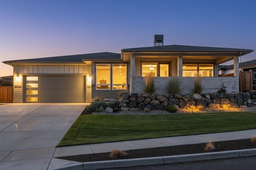 Beautiful single-level home in Redmond's premier neighborhood, offering comfort, style, and thoughtful design. Breathtaking Cascade Mountain views from the covered front deck and through expansive windows that fill the open floorplan with natural light. The spacious living area features a double-sided gas fireplace and a large dining area, ideal for entertaining or relaxing. The kitchen showcases granite countertops, large island, Bosch appliances including a built-in drawer microwave, under-cabinet lighting, and an impressive walk-in pantry. The private primary suite provides access to the back patio, a large bathroom with double sinks and tiled floors and shower, a large walk-in closet with built-in shelving, and direct access to the laundry room for convenience. Additional highlights include a tankless water heater and a 782 sq. ft. 3-car tandem garage with high ceilings for ample storage. Enjoy outdoor living on the covered front deck with its Cascade views or private back patio.