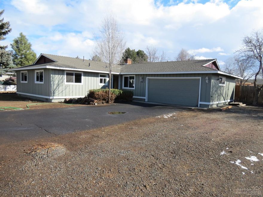 Take a look at this large .28 acres corner lot with alley access. Abundance of room for the RV and/or other possibilities. Home has been recently remodeled with all new flooring, paint, appliances including refrigerator, windows, kitchen cabinets with backsplash and upgraded faucet and sink. Large mature trees and shrubs. Double car attached garage with work area. Forced air gas furnace with A/C. 3 bedroom, 2 bath, vacant and ready to go.