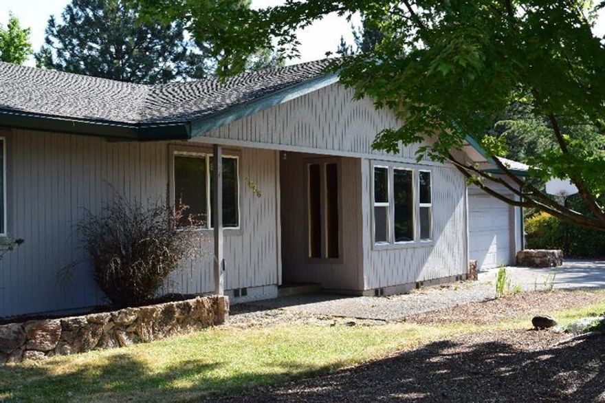 1979 custom built 3 bed, 2 bath Ranch style home with room for gardens in back. This well maintained property was remodeled and updated in 2007 with a new roof, heat and A/C system, carpet, flooring and double-paned windows. Two years later, the insulation was replaced. The master bedroom is large with a full bath, the other two bedrooms are also good-sized. Sunken living room, a breakfast nook in the kitchen or just outside it, and a bonus room with additional storage. Surrounded by a spacious .36 acre lot, you have paved RV parking and space to shoot baskets, and a large deck and patio area complimented by mature landscaping and trees. You will find a park like setting on the grounds. Not far to Jefferson Elementary and the new South Medford High.
