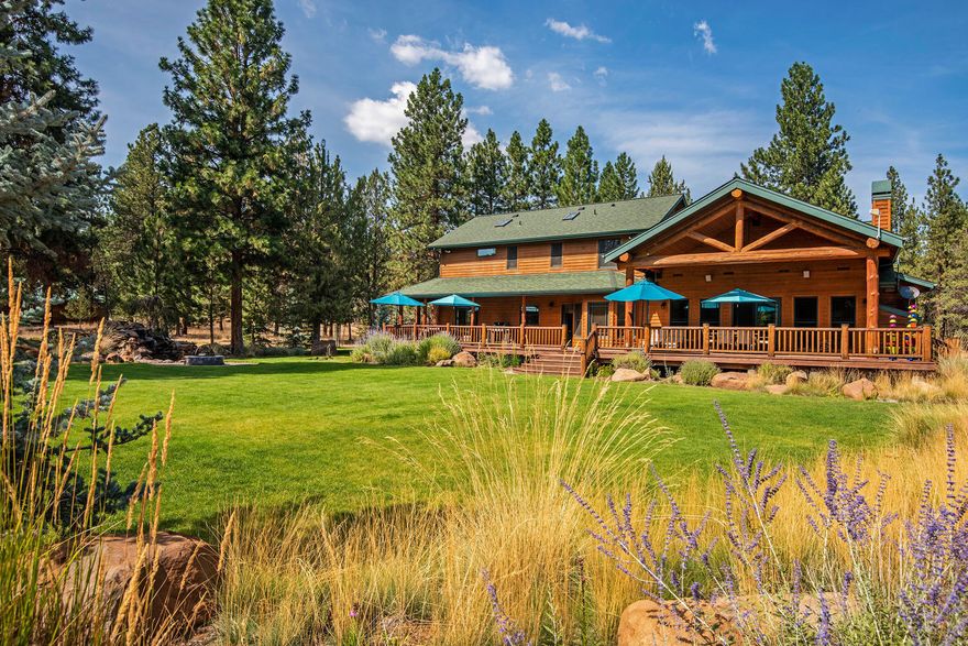 Immaculate 3457 SF Craftsman-style home includes a spotless 3,220 SF deluxe car garage with 14' RV rollups, office & guest area.  Beautifully landscaped, 4.85 pine treed acres in Junipine Acres, one of Sisters' most coveted paved communities with access to a private park on Whychus Creek. The entire property is turnkey. The home's main level has hardwood oak floors, a living room, family room, office, dining room, breakfast area, cook's kitchen, butler pantry, half bath, and a laundry room.  All appliances and mounted TVs are included! Upstairs are 4 bedrooms which includes the bonus room plus a guest bath. The master has 2 walk-in closets and a walk-in shower. Relax on the covered back deck while enjoying the waterfall, fire pit, horseshoe pit, & lush lawn landscaping all on a sprinkler and drip system. The RV shop has 4 bays, a private office/guest area, 1½ baths, kitchenette, art gallery, workshop, loft, RV parking & more! 2 horses permitted per HOA. 4.4 miles to downtown Sisters.