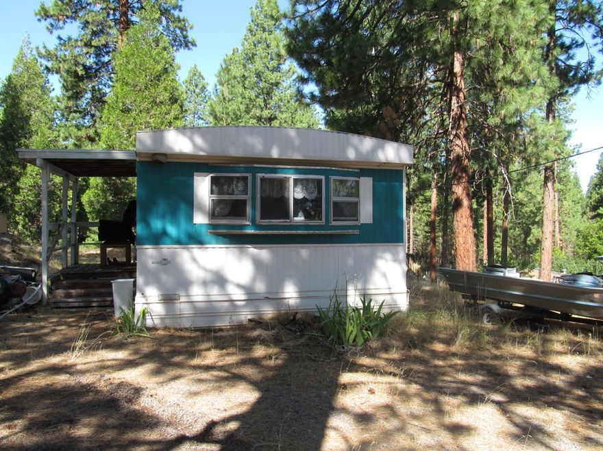 Cute and cozy 2 bedrm 1 bath 1979 Ridgewood manufactured home (14x56) situated on .51 acres among the pines in Keno location. Home features roomy bedrooms and closet space. Seller recently purchased the stainless steel, double door refrigerator/freezer which is included. in sale. Owner will carry w/substantial down payment. Property to be sold in AS IS condition. Some windows may be single pane. Seller pays $75.00 per month for water from the Keno Water Company. Manufactured structure serial # LL1462B09L15195, X#162572, home ID 226782.