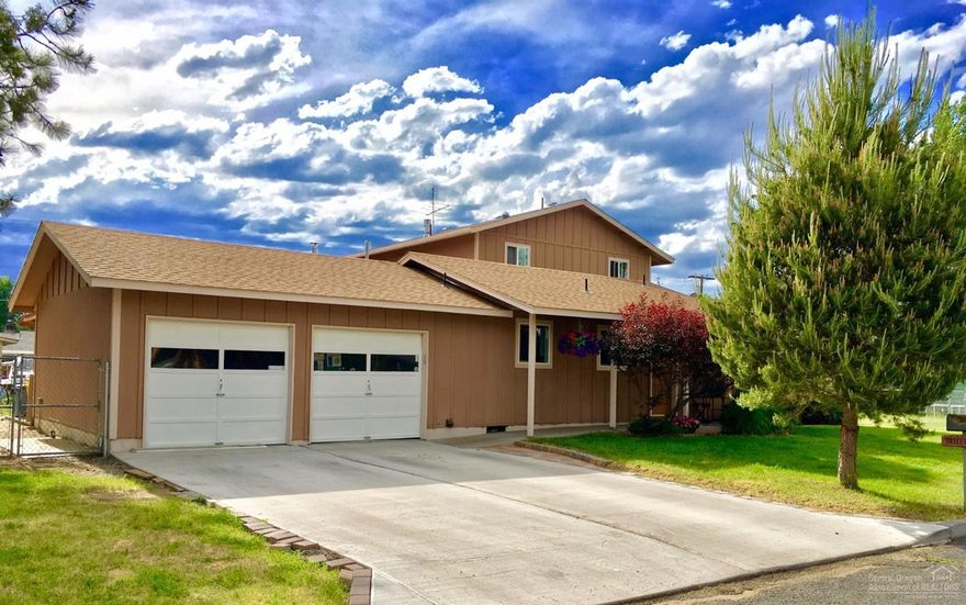 Beautifully remodeled large home on quiet street in the heart of Prineville. 3bd, 2.5bath plus office/hobby rm, 2621 sqft. Mastersuite boasts gas fireplace, tile shower, soaking tub, walk in closet and it's own private deck. Kitchen remodel just finished, open concept, white cabinets, island with breakfast bar. Double car garage, RV parking. Fenced backyard with deck and hot tub. Do not miss this gem in downtown!