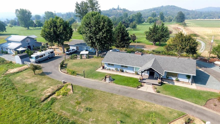 Wow Factor! Amazing one level estate with so many uses! Pasture is in front of the house and you have irrigation rights from Ft Vannoy Irrigation district! The 1742 sq foot house has been remodeled and totally updated with modern amenities. Two car garage connected to house. Circle driveway will take you to the 1248 sq foot guest qtrs. With two bedrooms, bath & kitchen. Great landscaping with water features, your backyard looks onto Dutcher Creek Golf course!!!! Now for the extra bonus is this 3072 sq foot Hobby or shop or entertaining area with loft above. This is the perfect entertaining room for large gatherings. Simply amazing! Lots and lots of storage and parking. Sellers have put lots of love into this entire property. This is one of a kind and minutes to city limits. Check this one out and get ready to move in! All information deemed accurate but not guaranteed and subject to change at any time.