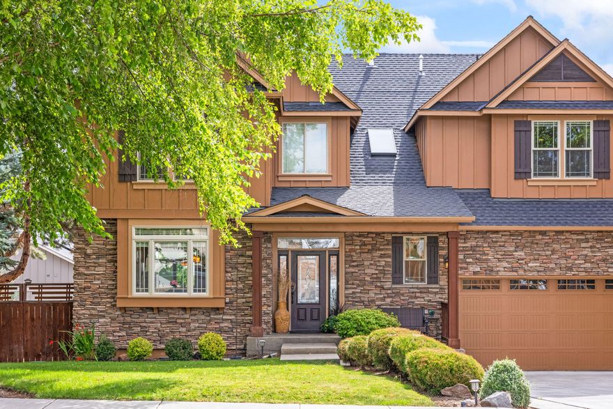 Beautifully maintained 4-bedroom + bonus room home near Sage Elementary! This spacious layout features 9' ceilings, hardwood floors, A/C, ceiling fans, and a tandem 3-car garage. The open great room centers around a cozy gas fireplace and connects to a large kitchen with granite tile counters, island seating, stainless steel appliances, pantry, and abundant cabinetry. Set on a fully fenced 0.21-acre lot with east-facing deck,  perfect for shade in the summer evenings, landscaped yard, and potential RV parking. Main-level bedroom doubles as a home office. Upstairs offers a vaulted primary suite with walk-in closet and spa-like bath, plus two more bedrooms, guest bath, and a large bonus room.