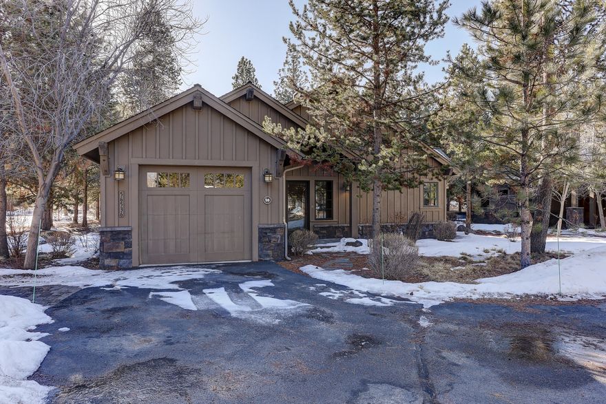 Introducing a beautiful single level Sun Forest cabin located in the highly sought after community of Caldera Springs! Before you enter, you'll be welcomed by a spacious front porch with barbeque. Inside you will find vaulted ceilings, knotty alder cabinetry throughout, hardwood floors, large windows, timber accents and a stone fireplace.  The primary suite is on one side of the home and 2 additional en-suites on the opposite side. Enjoy your summer evenings in the spacious outdoor patio, featuring outdoor dining and a hot tub. Location features open common area to the east of the home and convenient access to bike trails, the Lake House and Quarry Pool.  Owners will enjoy Caldera Springs living with access to all existing and forth-coming amenities, including golf, Quarry pool & fitness, bike and kayak rentals, and the highly anticipated Forest House. Fully furnished and a turn-key vacation home. Make this your home away from home for summer or winter getaways!