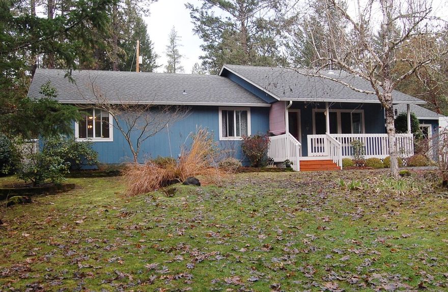 Wonderful home just outside of the city of Grants Pass and down the road from the college.  This 3 bedroom, 2 bath, 1700 sq ft home is located on 5.02 private acres. The home features an open floor plan,  certified wood stove in the living room, a great kitchen with quartz counter tops and lots of storage.  The two baths also feature quartz counter tops.  Lots of natural trees on the property to offer privacy, large garden areas, and a variety of fruit trees; apple, cherry, plum, peach, pear, persimmon, fig, as well as blueberry, raspberry, thorn less blackberry and grapes.