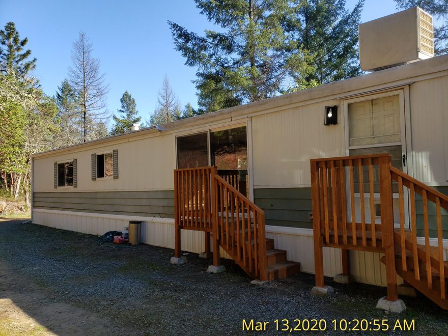 2 bedroom and 2 baths manufactured home with split floor plan in the country. This 80 acres offers pricacy and wildlife. The mountain behind the house offers an abundance of trees and is private and peaceful.
No out buildings or garage but room to add one.