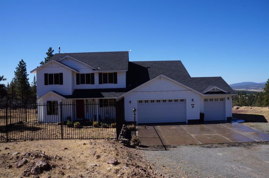 Home Of Your Dreams! Beautiful 5 Bedroom 3.5 Bath Set On 7.4 Acres With Breathtaking Views Of Surrounding Valley And Mountains! Find Complete Comfort In New Ranch Style Home With All Modern Amenities! Start Living The American Dream Today!Beautiful Spacious Home In Country Setting. Beautiful Vistas Of Surrounding Wilderness And Cascade Ranges! This Home Is Energy Efficient With 8000 Watt Solar System! Features Include Certified Wood Stove, Cadet Heating In Every Room And Interior Walls Are Fully Insulated! The Layout Features Two Levels. First Floor Offers A Large Master Suite With Private Full Bath, Handicap Access And Large Walk In Closet. Gourmet Style Kitchen With Stainless Steel Appliances, Silestone Counter Tops And Alder Wood Cabinets. Even Has A Brand New Dishwasher! Kitchen Opens To An Informal Dining Room With Custom Wood Floors Featuring An Oak Wood Moca Top. Lower Level Showcases A Family Living Area, Private Den, 1.5 Bath, And A Large Utility Room, With Ample Space.