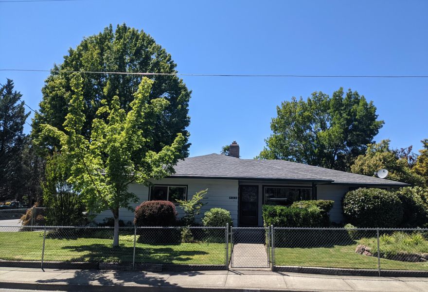 This wonderful corner lot home features 1364 sq. ft of living space and 504 sq. ft attached garage.  Outside you will find plenty of parking as well as RV parking along side the home.  As you walk inside you will notice a large living room with gas fireplace.  Natural light flows within.  The kitchen has plenty of cabinet and counter space.  Between the kitchen and garage is a large laundry room.  The three bedrooms are very large.  There is also a dining room area.  This home has a covered back patio as well as a shed.