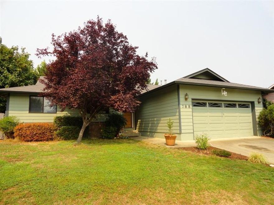 Sitting in a desirable subdivision sits a 1461 sf 3 bedroom, 2 bath home. Vaulted ceiling, ceiling fans, dining room, laundry room. Plenty of cabinets. Large deck out back side yard could be finished as garden, add your pool or plant grass.