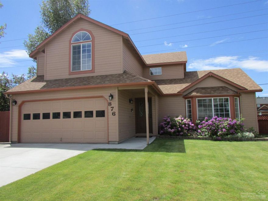 This beautiful 3 bedroom 2.5 bath home sits on a large corner lot in the desirable Providence neighborhood and is move in ready. Kitchen has quartz countertops & stainless appliances and all bathrooms have quartz countertops, new flooring and paint. There are vaulted ceilings in living room and in Master suite and 2nd floor deck has mountain views. The large backyard is fully fenced, has sprinkler system, garden area and custom patio. Paved RV area and room for all your toys, AC, NEW roof! A must see!