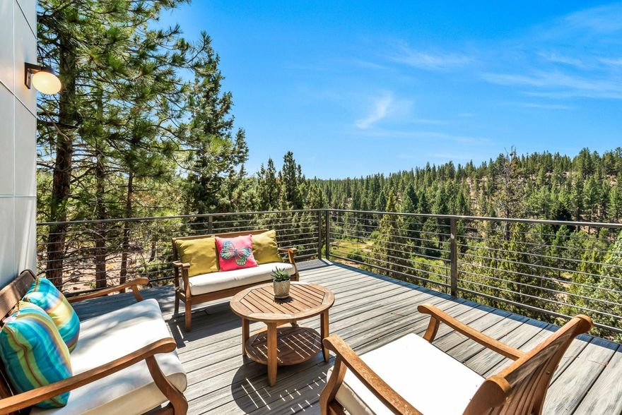 Entertain in this contemporary NW style home situated on a very valuable parcel of land In NW Bend. 7.44 acres adjacent to protected open space along Tumalo Creek, Minutes from Shevlin Park, The Deschutes River, Phil's Trail and Downtown Bend. This private oasis is an opportunity of a lifetime. Views of Mt. Bachelor, Tumalo Creek, pine covered hills and the grassy meadow below, with stands of aspen, willow and pine. Hear the peaceful sounds of the creek while enjoying the wraparound deck. Hiking and biking opportunities are endless.