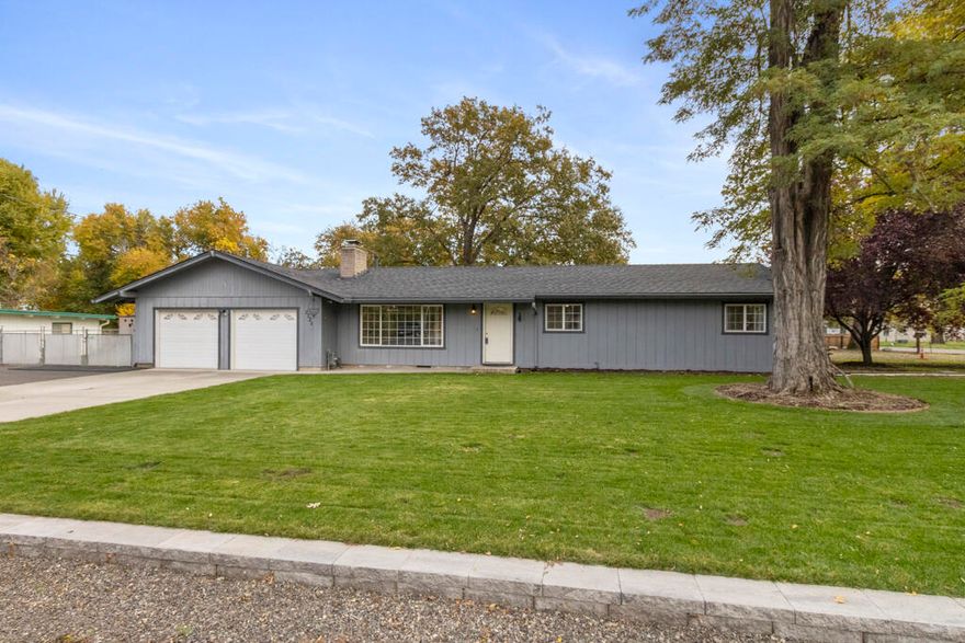 Location, Location, Location! Don't miss this one! Turn-key single-level home on a spacious .53-acre lot in a desirable Central Point neighborhood. This 3-bed, 2-bath, 1,370 sq ft home features brand-new stainless steel appliances (less than a year old), newer carpet, and security cameras. Enjoy beautifully maintained front and back lawns with in-ground sprinklers on a timer, a fully fenced yard, and great outdoor amenities including an above-ground pool and jacuzzi—both included. Property offers a powered work shed, RV parking with dump and power hookups, plus a garage with compressor and hook-up. Peaceful established area just minutes to downtown Central Point, schools, and shopping. Truly move-in ready and well cared for. Select photos are virtually staged to show potential layout and furniture placement.