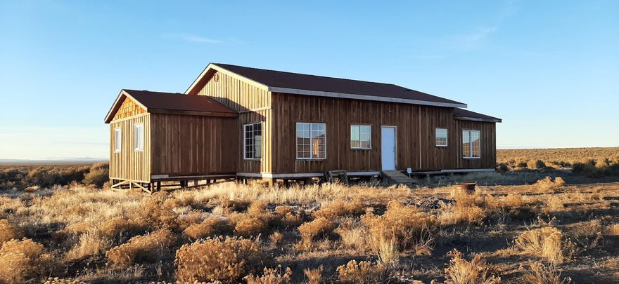 A stargazers delight of 5 acres with direct BLM access on two sides offering privacy, recreation, and endless potential. Roughed?out 3BR/1BA structure started. Perfect for finishing as a home, cabin, or guest quarters. Expansive land with mountain views, sunsets, and trails for hiking, riding, or ATV adventures, all minutes from town amenities.Adjoining 5 acres for sale through separate transaction.