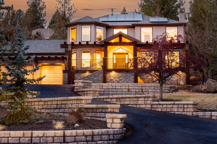 Location! Location! Location! Stunning westside home on south facing .60 acre lot with lots of privacy. BIG southern views all the way to the Paulinas seen from the living room, dining room, kitchen, master and upstairs guest bedroom. Four bedrooms plus office and 3 full baths in 2562 feet. Oversized heated and insulated 3 car garage, 33ft x 26ft with 220 power in place. Covered patios in the front and back of the home. Back patio is 24ft x 42ft with skylights and hot tub. The front patio is 4ft x 11.6ft. Grid Tied Solar system keeps utilities low. (see attached records) 7 year old fiberglass shingle roof with 30 year lifespan. The community has tennis and pickleball court with a low HOA of $350 per YEAR. All furnishings including the athletic equipment are available for sale outside of escrow. Washer/dryer/hot tub/backyard shed/refrigerator are all included with sale.