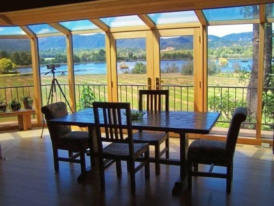 First time on the market. An exquisite custom estate with gated entry. Quality features throughout including oak hardwood floors, granite counter tops and showers, old growth paneling (western red cedar), walk in closets (his & hers) and safe. Gas fireplace. All overlooking a 67 acre fish filled lake with several out buildings. Boat house, paved boat ramp and volley ball court & fire pit. Additional out buildings include barn with tack room & stalls, motor home garage 30' by 44', 5 bay carport 60' long, additional living quarters (hardship)studio with 1200 sq ft. plus 900 sq ft storage. Not a drive by. Shown by appointment only. 3 tax lots.