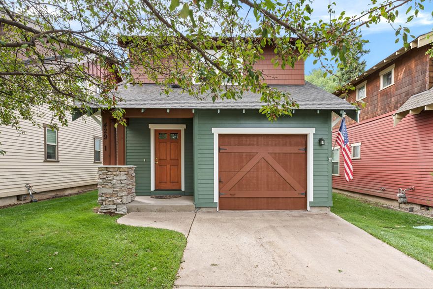 Prime midtown location with built-in income potential! This versatile property features a 1,629 sq ft main home with 2 bedrooms, 1.5 bathrooms, a cozy fireplace, abundant natural light, and a well designed kitchen with generous storage plus a single-car garage. The highlight is a 520 sq ft ADU—perfect for long-term rental income, guest quarters, or multi-generational living. A spacious 2car garage adds convenience, and low-maintenance landscaping keeps upkeep simple. Enjoy being just minutes from parks, schools, shopping, dining, and vibrant downtown Bend. Whether you're seeking a comfortable home with extra space or a smart investment in a sought-after neighborhood, this property delivers both lifestyle and revenue in one inviting package.