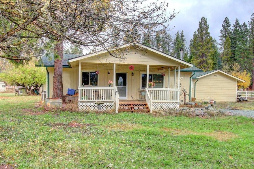 Even the drive home is lovely, winding through country properties, pastures and woodland. Great 3 bedroom home with large master suite on flat, usable and fully fenced land located several miles from the town of Rogue River. Sit on your covered porch and enjoy views of grazing horses on neighboring properties.