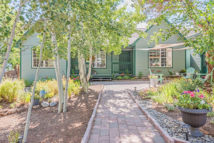 Rare Tumalo opportunity! Enjoy million-dollar Cascade Mountain views for under a million. Updated 3 bed, 2 bath single-level home on 1.06 acres. Recent remodel includes a new kitchen with quartz counters, stainless appliances, updated baths, new lighting, and flooring. Vaulted living room with skylights, wood stove, and mini split for year-round comfort. Spacious bonus room with Lopi propane stove—ideal for gym, office, or future expansion. Oversized 2-car garage with RV doors plus large driveway. Covered and open decks overlook fully fenced yard, mature landscaping, fruit trees, and organic gardens. Room for ADU, shop, or more (buyer to verify). Private Avion water, peaceful neighborhood, and quick access to Bend and Redmond.