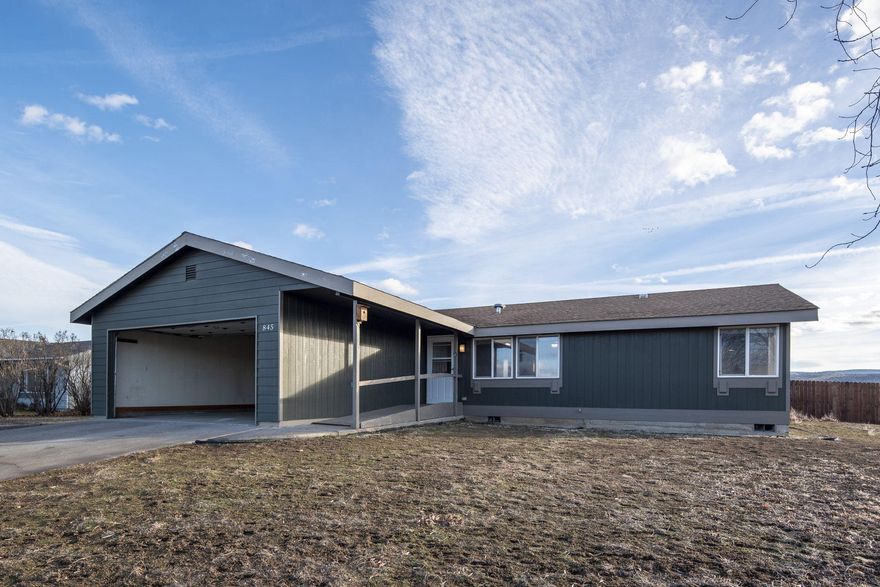 Here is your chance to own a very beautiful single level home in town close to all the necessities. This 3 bed, 2 bath home features a very spacious open feeling floor plan. The interior has been updated and very well taken care of with updated flooring, paint and other additional updates making this home completely move in ready! All of this on a large quarter acre lot with a double car garage and RV parking available. Don't miss your chance on this amazing opportunity.