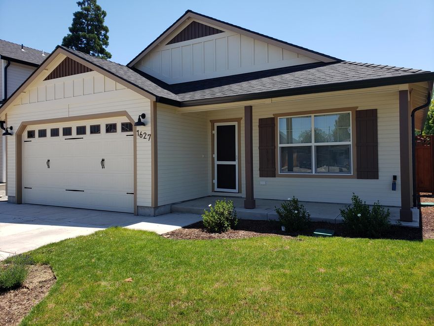 This newly built home features granite counters, stainless appliances including refrigerator, landscaped front and backyards and window coverings!  This house is truly move in ready.  Light and bright with neutral colors, extra closet storage in laundry room and finished two car garage.  Covered front porch to enjoy year-round and close in convenient location.